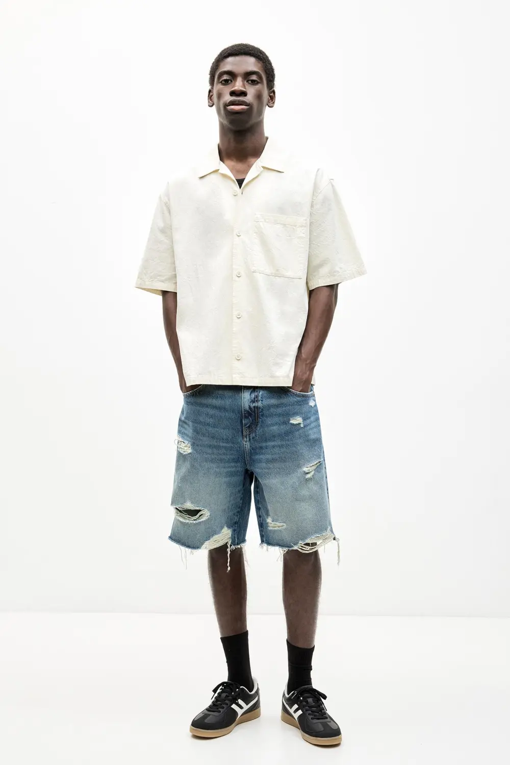 Ripped denim Bermuda shorts