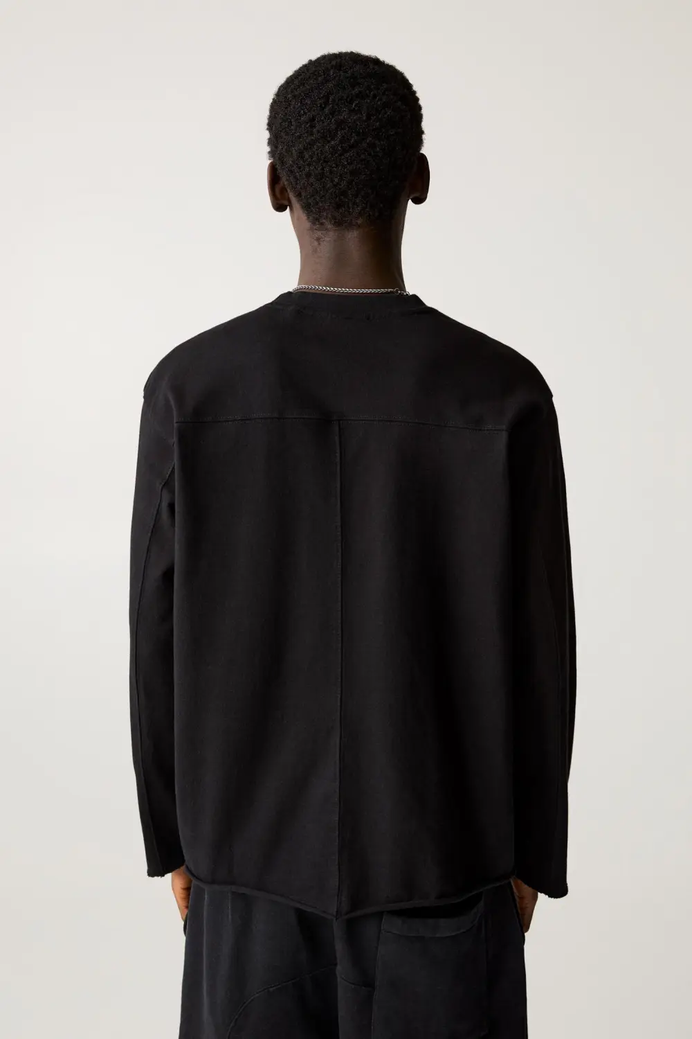 Faded T-shirt with frayed hem