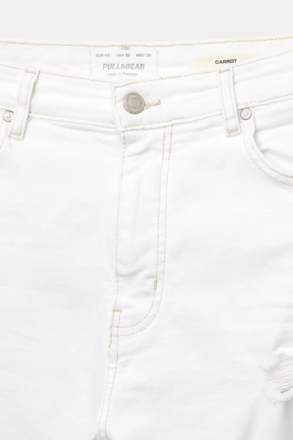 Ripped carrot fit jeans