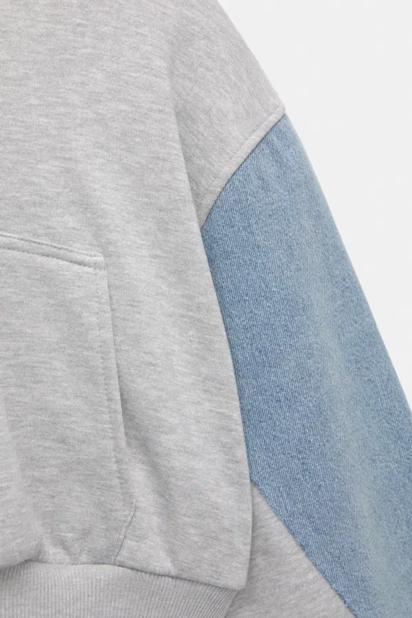 Sudadera cropped mangas vaqueras