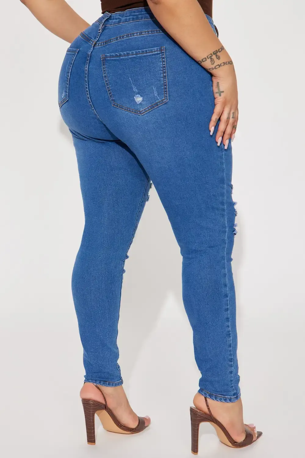 Molly Mid Rise Ripped Stretch Skinny Jeans - Medium Wash