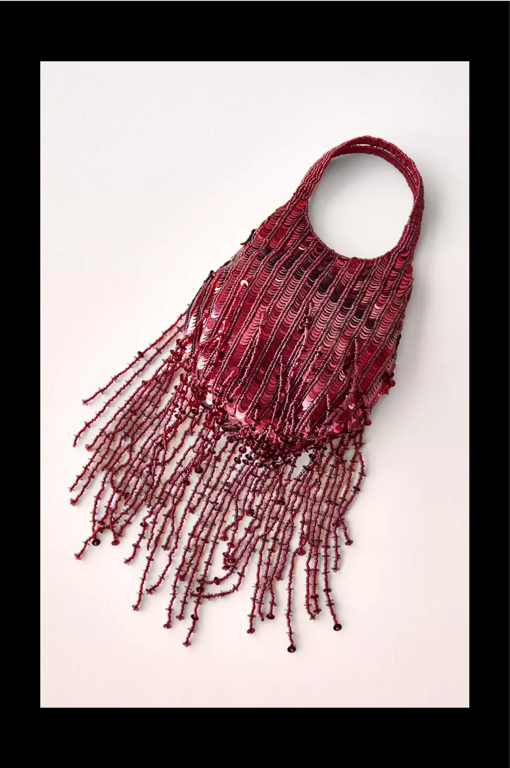 Bolso abalorios flecos